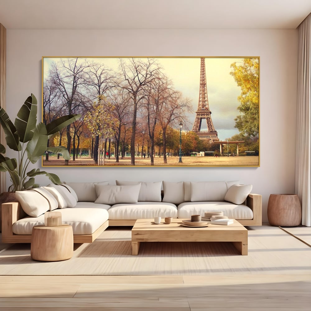 Tablou canvas cu tablou canvas cu turnul eiffel toamna, in rama de aluminiu auriu, pe perete intr-un living