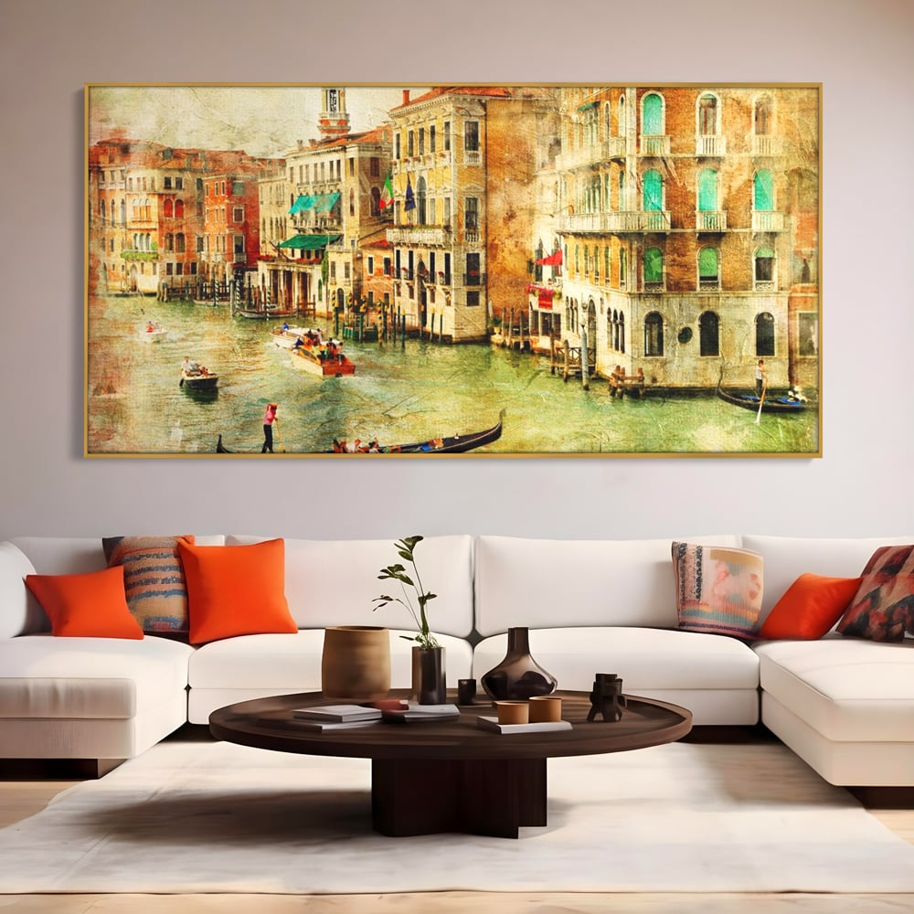 Tablou canvas cu tablou pictura canal venetia, in rama de aluminiu auriu, pe perete intr-un living