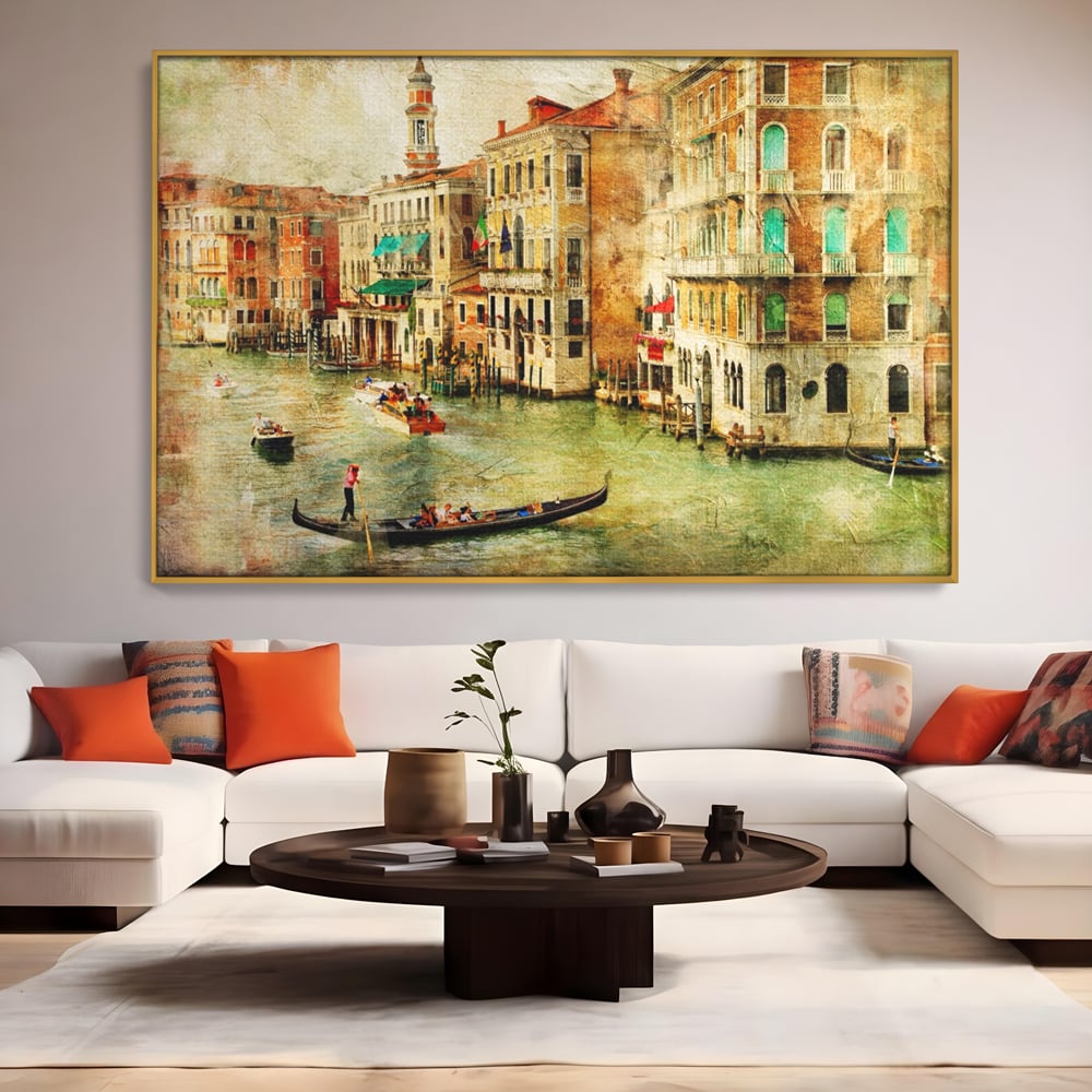 Tablou canvas cu tablou pictura canal venetia, in rama de aluminiu auriu, pe perete intr-un living
