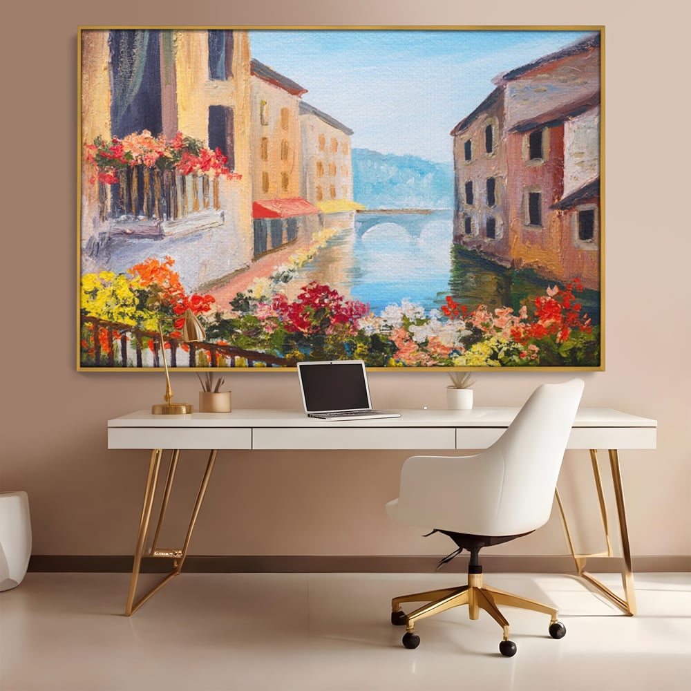 Tablou canvas cu pictura cu canal italian si flori, in rama de aluminiu auriu, pe perete intr-un birou