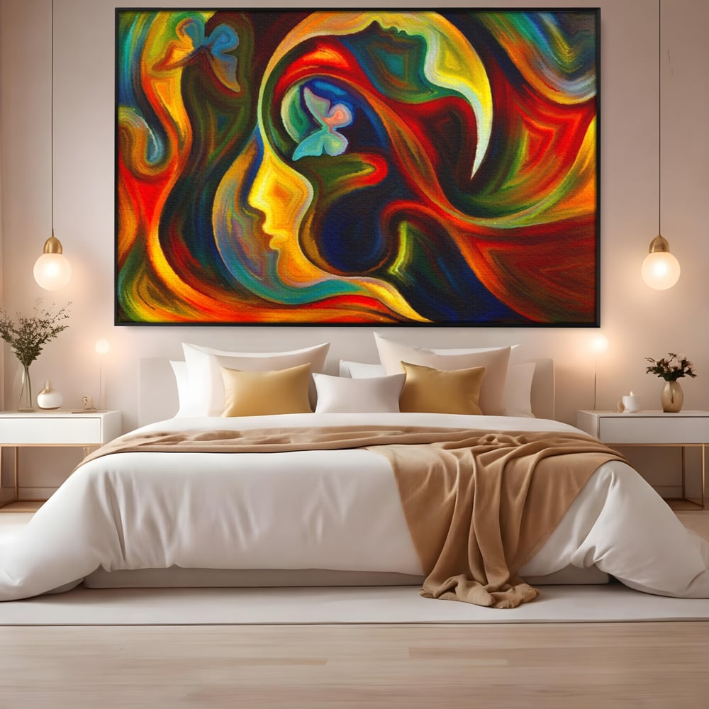 Tablou canvas cu pictura abstracta cu profil uman si fluturi, in rama de aluminiu negru, pe perete intr-un dormitor