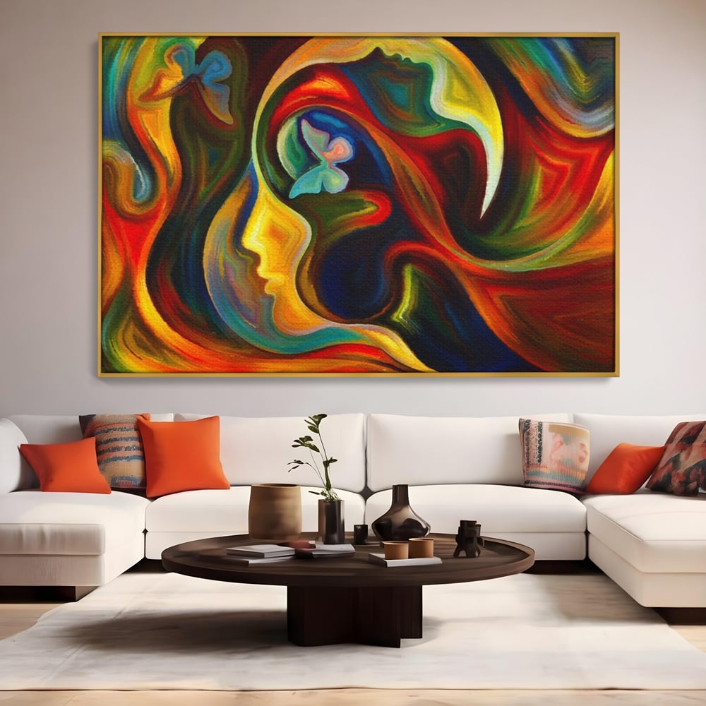 Tablou canvas cu pictura abstracta cu profil uman si fluturi, in rama de aluminiu auriu, pe perete intr-un living