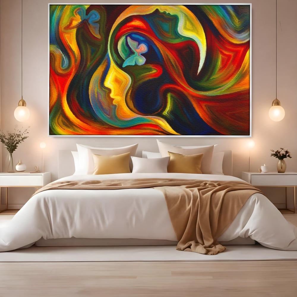 Tablou canvas cu pictura abstracta cu profil uman si fluturi, in rama de aluminiu argintiu, pe perete intr-un dormitor