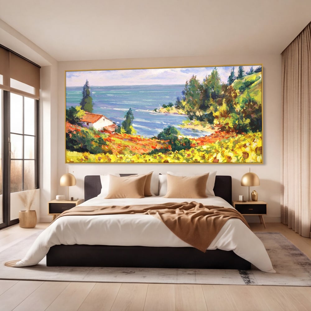 Tablou canvas cu pictura camp cu floarea soarelui si mare, in rama de aluminiu auriu, pe perete intr-un dormitor