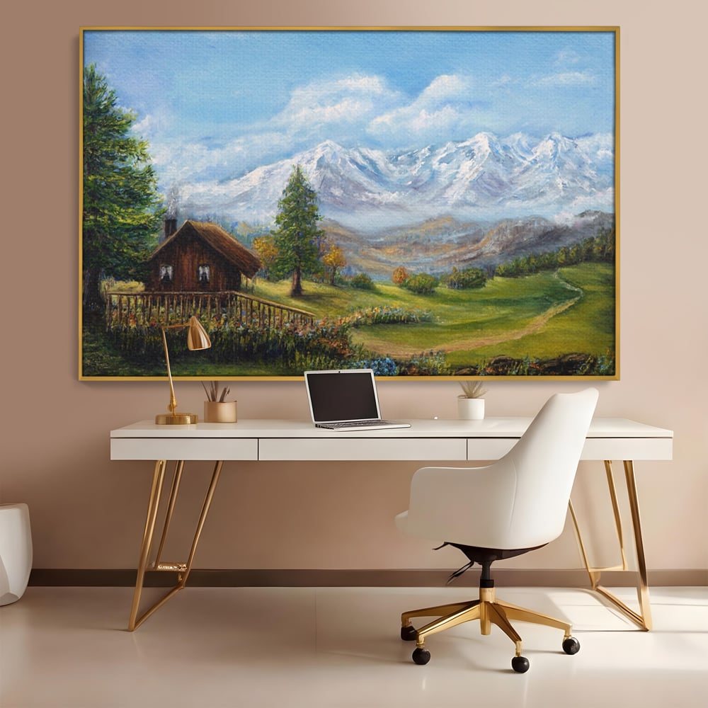 Tablou canvas cu tablou canvas cu peisaj montan si cabana, in rama de aluminiu auriu, pe perete intr-un birou