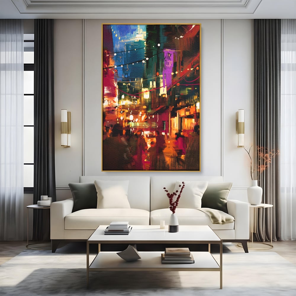 Tablou canvas cu tablou canvas cu peisaj urban nocturn, in rama de aluminiu auriu, pe perete intr-un living