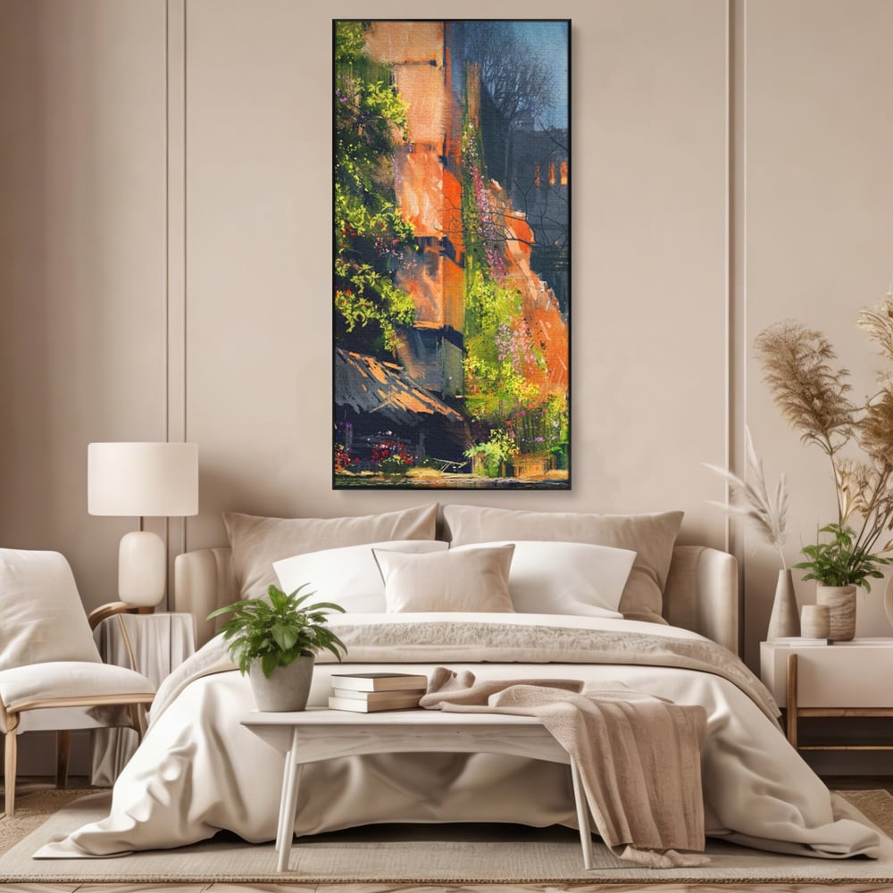 Tablou canvas cu pictura verticala cu ziduri vechi si flori, in rama de aluminiu negru, pe perete intr-un dormitor