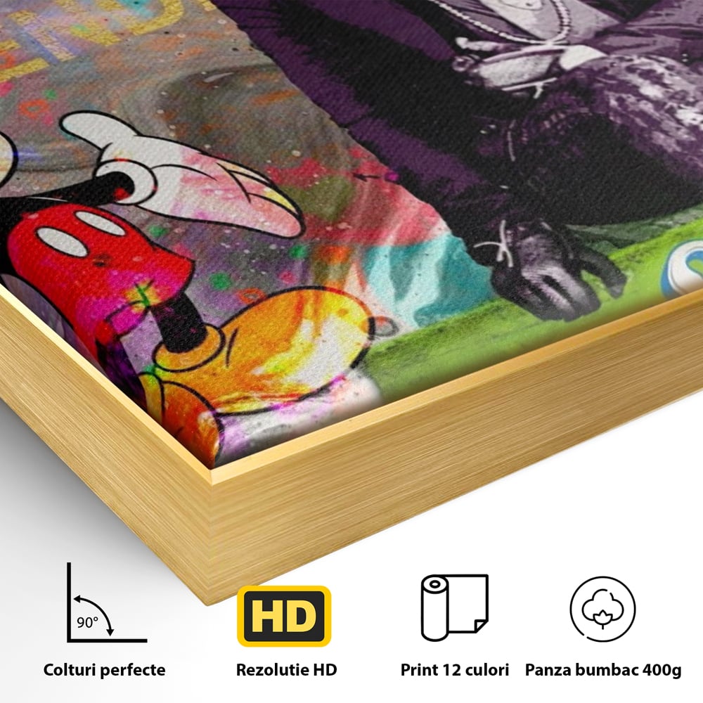 Detaliu al suprafetei: tablou canvas cu mickey mouse si karl lagerfeld, in rama de aluminiu auriu