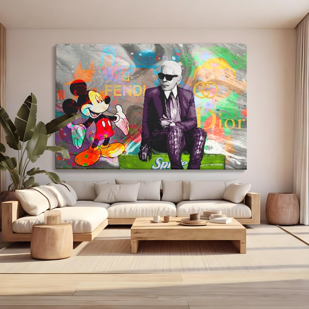 Tablou canvas cu tablou canvas cu mickey mouse si karl lagerfeld, fara rama, pe sasiu de lemn, pe perete intr-un living