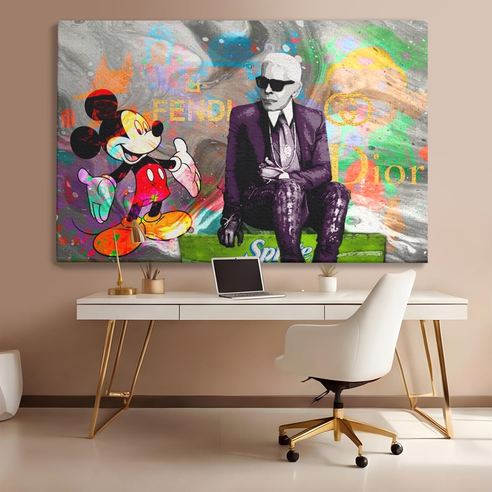 Tablou canvas cu tablou canvas cu mickey mouse si karl lagerfeld, fara rama, pe sasiu de lemn, pe perete intr-un birou