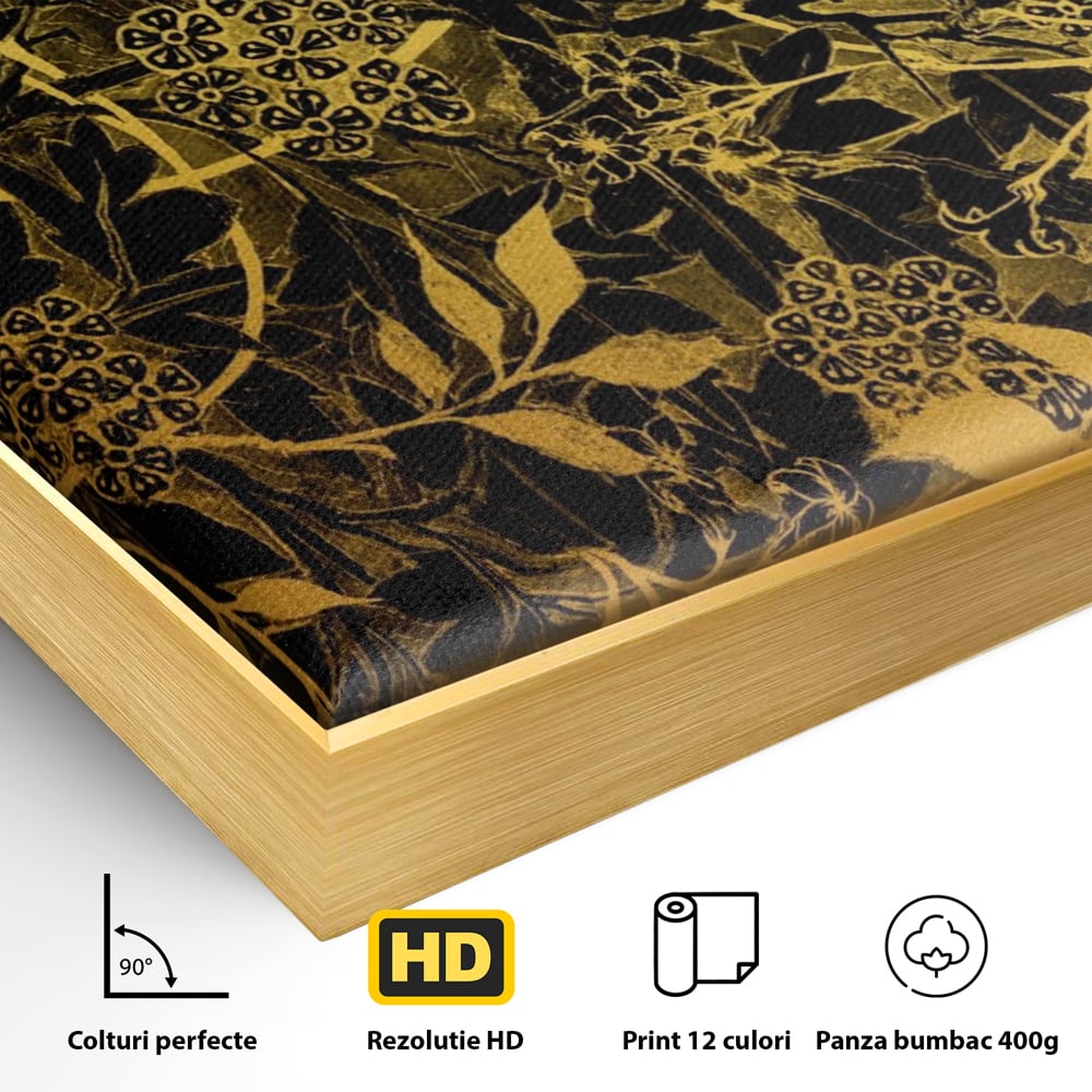 Detaliu al suprafetei: model floral auriu pe fond negru, in rama de aluminiu auriu