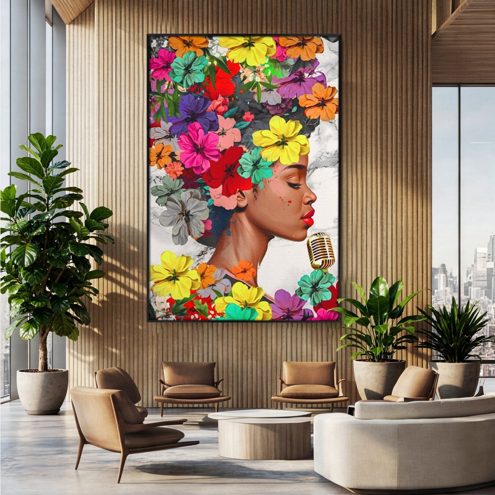 Tablou canvas cu tablou canvas cu fata si flori, in rama de aluminiu negru, pe perete intr-un birou