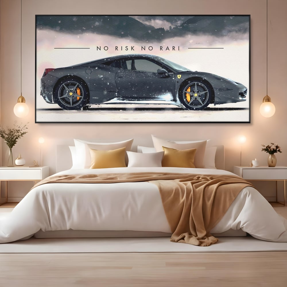 Tablou canvas cu tablou canvas cu masina ferrari pe zapada, in rama de aluminiu negru, pe perete intr-un dormitor