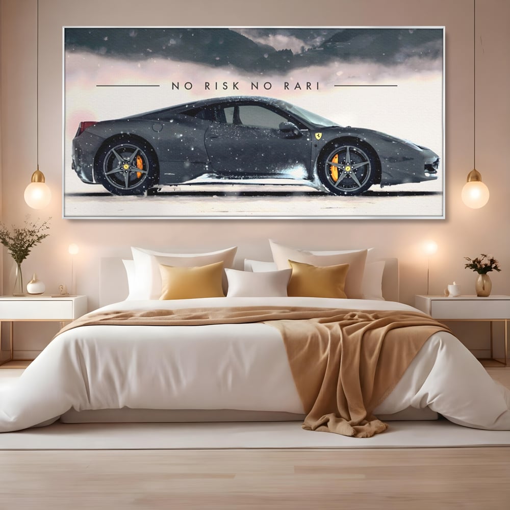 Tablou canvas cu tablou canvas cu masina ferrari pe zapada, in rama de aluminiu argintiu, pe perete intr-un dormitor