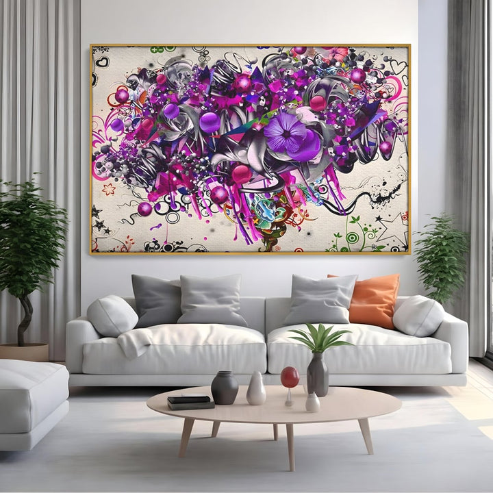 Tablou canvas cu tablou canvas cu flori mov si inimi, in rama de aluminiu auriu, pe perete intr-un living