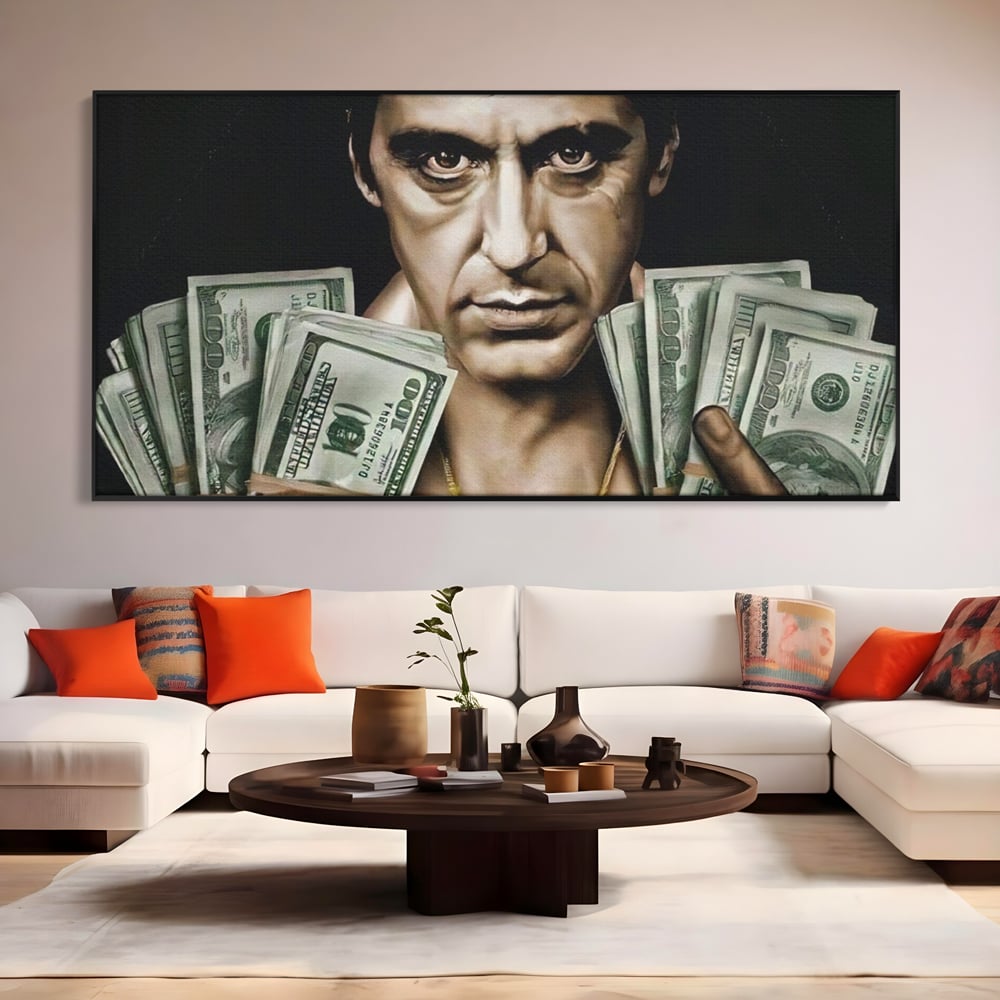 Tablou canvas cu tablou canvas cu tony montana, in rama de aluminiu negru, pe perete intr-un living