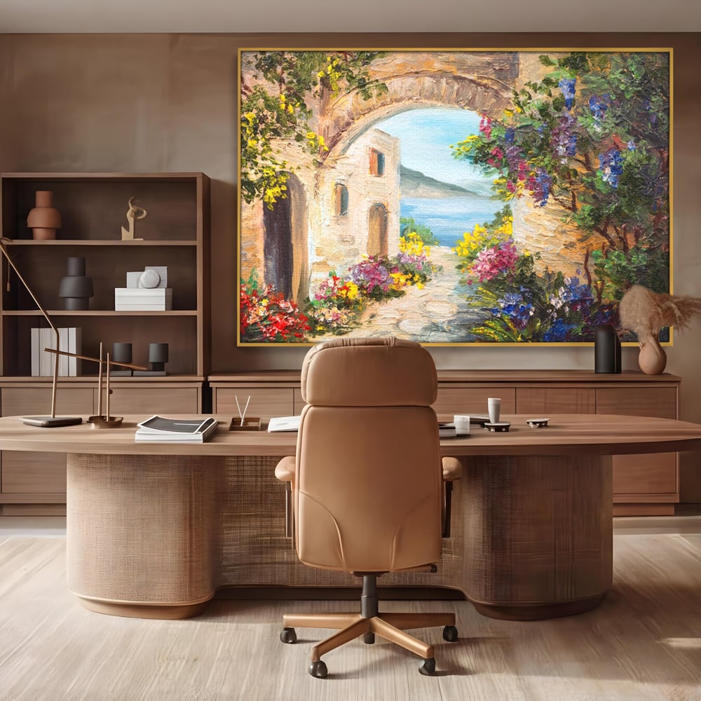 Tablou canvas cu pictura in ulei cu arcada de piatra si mare, in rama de aluminiu auriu, pe perete intr-un birou