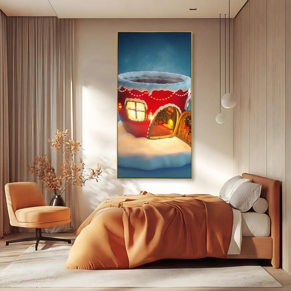 Tablou canvas cu ilustratie cana rosie cu casa de craciun, in rama de aluminiu auriu, pe perete intr-un dormitor