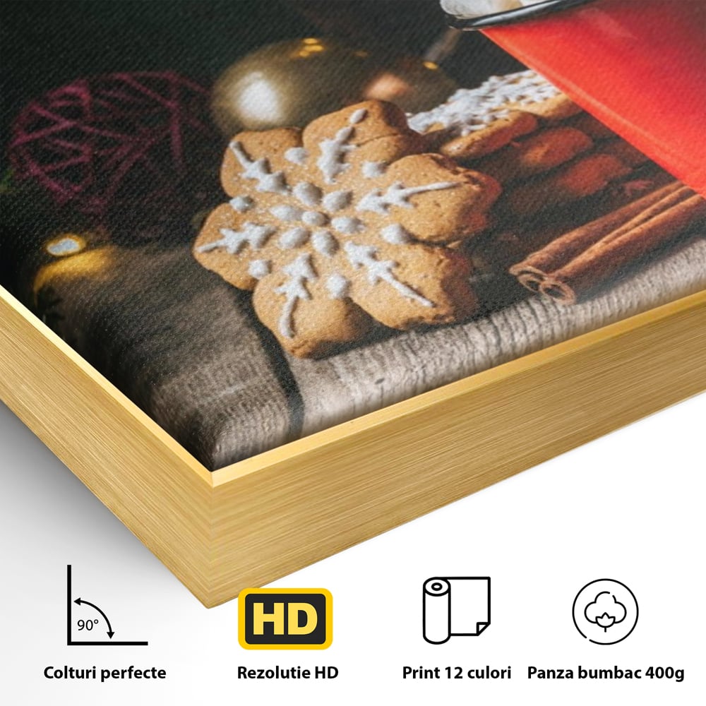 Detaliu al suprafetei: tablou canvas cu turta dulce si cana rosie, in rama de aluminiu auriu