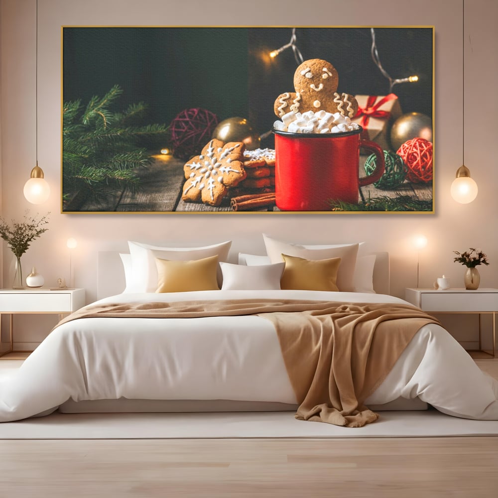 Tablou canvas cu tablou canvas cu turta dulce si cana rosie, in rama de aluminiu auriu, pe perete intr-un dormitor