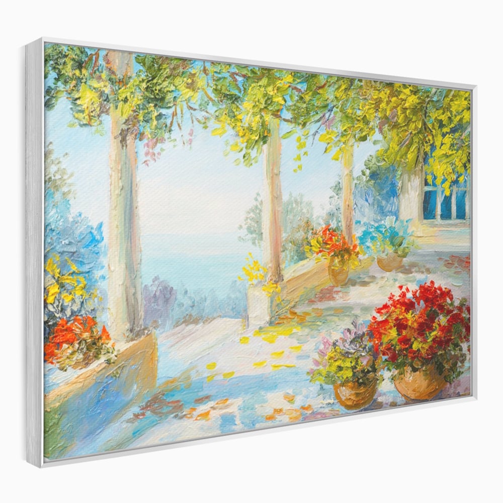 Tablou canvas cu pictura terasa insorita cu flori rosii, in rama de aluminiu argintiu