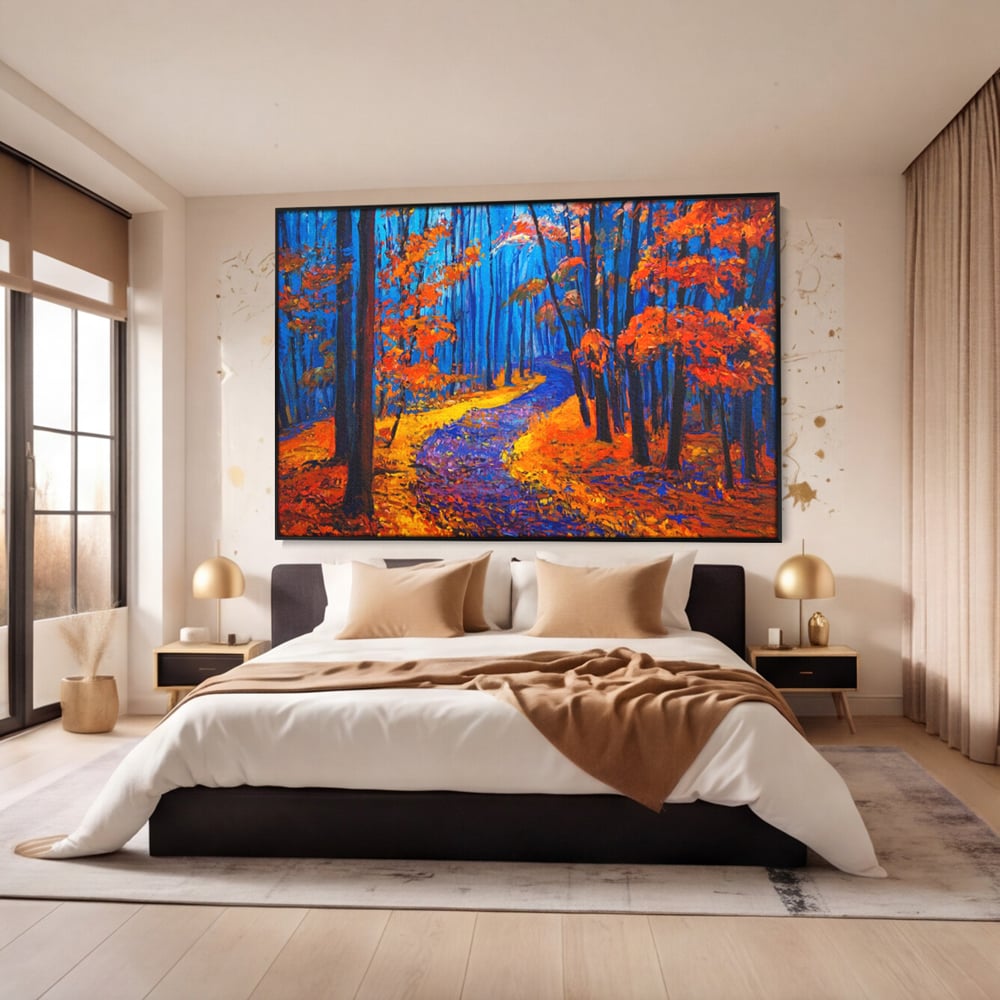 Tablou canvas cu pictura cu padure de toamna si poteca, in rama de aluminiu negru, pe perete intr-un dormitor