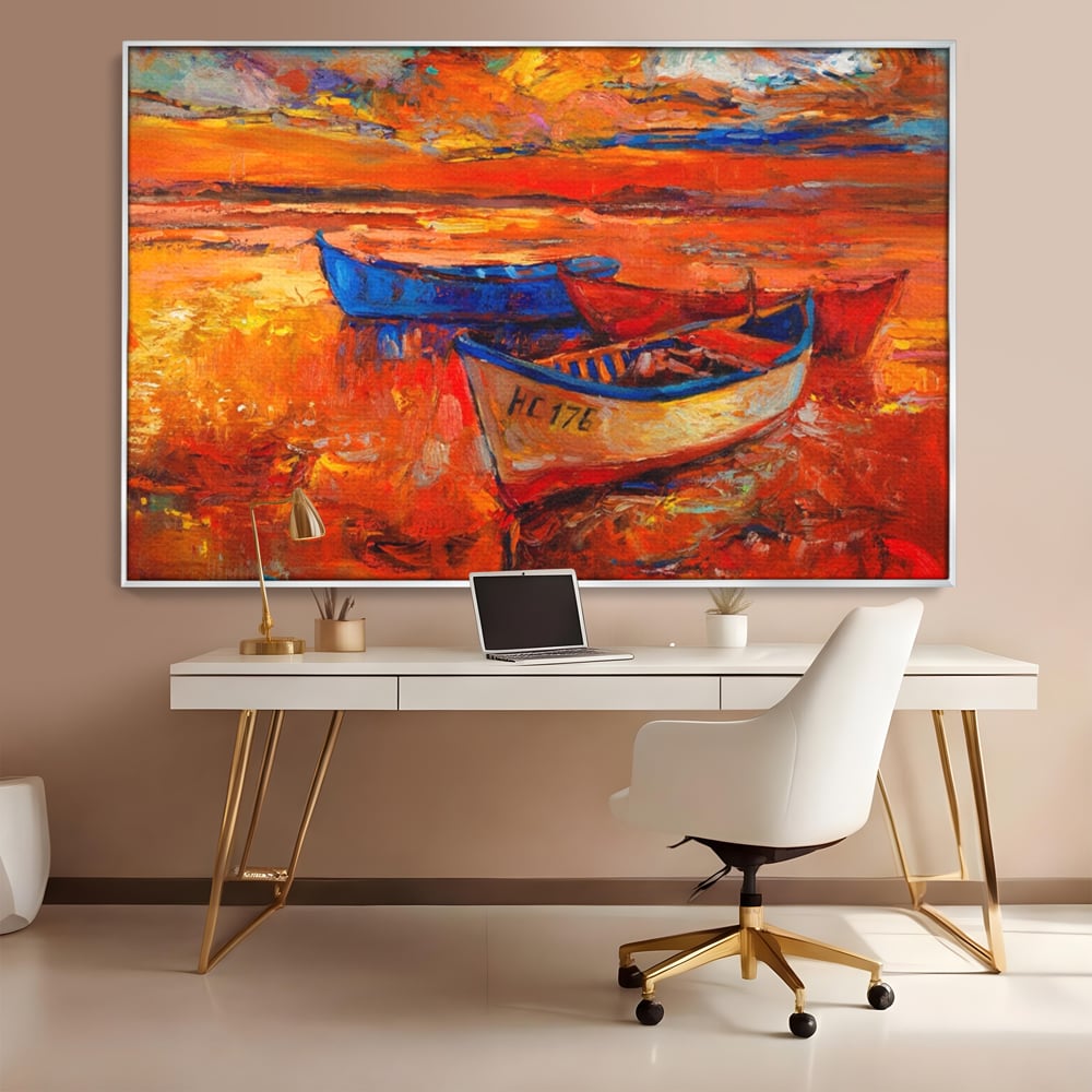 Tablou canvas cu pictura cu barci la apus, in rama de aluminiu argintiu, pe perete intr-un birou