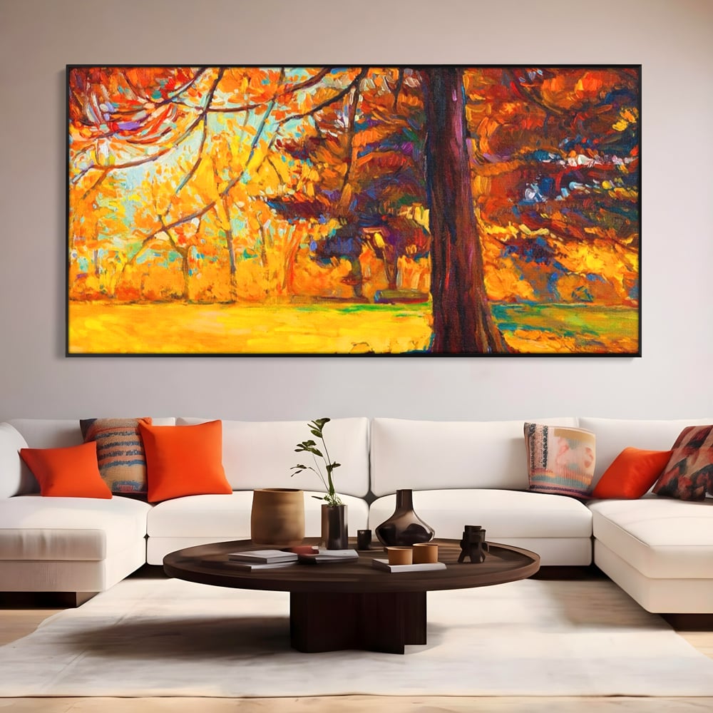 Tablou canvas cu pictura in ulei cu padure de toamna, in rama de aluminiu negru, pe perete intr-un living