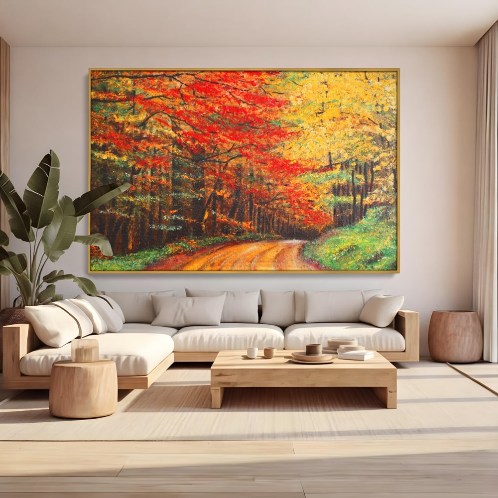 Tablou canvas cu pictura peisaj cu drum prin padure toamna, in rama de aluminiu auriu, pe perete intr-un living