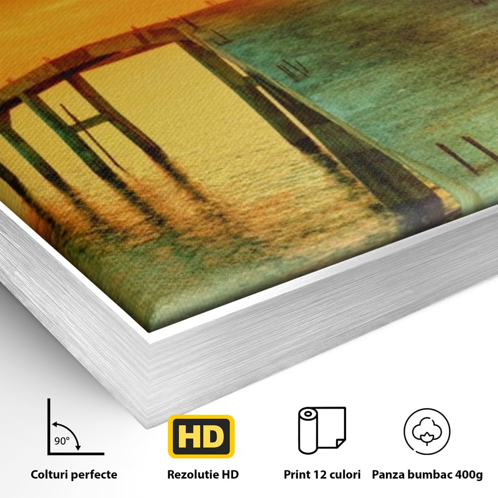 Detaliu al suprafetei: tablou canvas cu pod si rasarit de soare, in rama de aluminiu argintiu