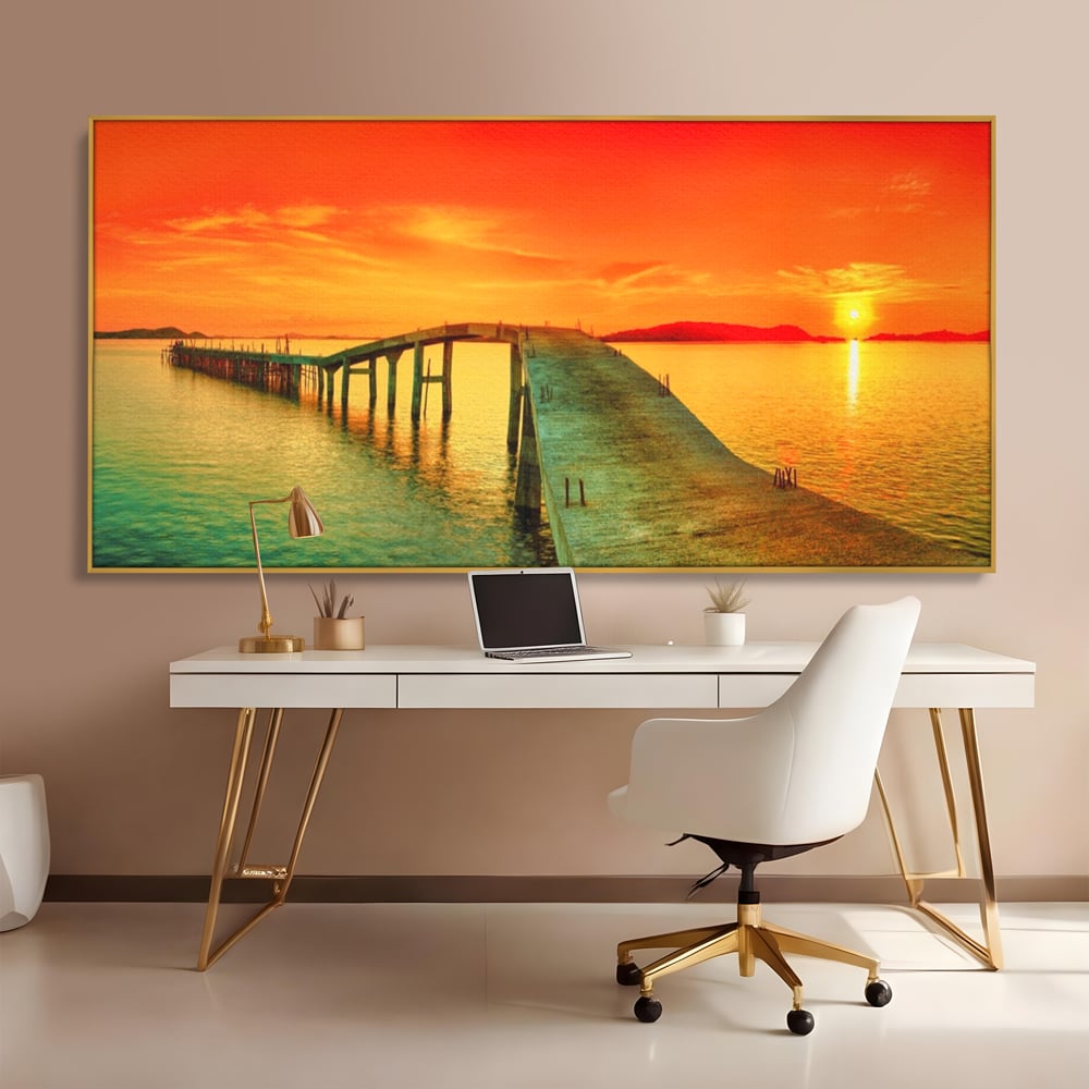 Tablou canvas cu tablou canvas cu pod si rasarit de soare, in rama de aluminiu auriu, pe perete intr-un birou