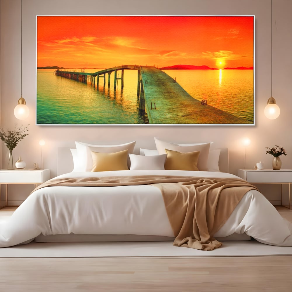 Tablou canvas cu tablou canvas cu pod si rasarit de soare, in rama de aluminiu argintiu, pe perete intr-un dormitor