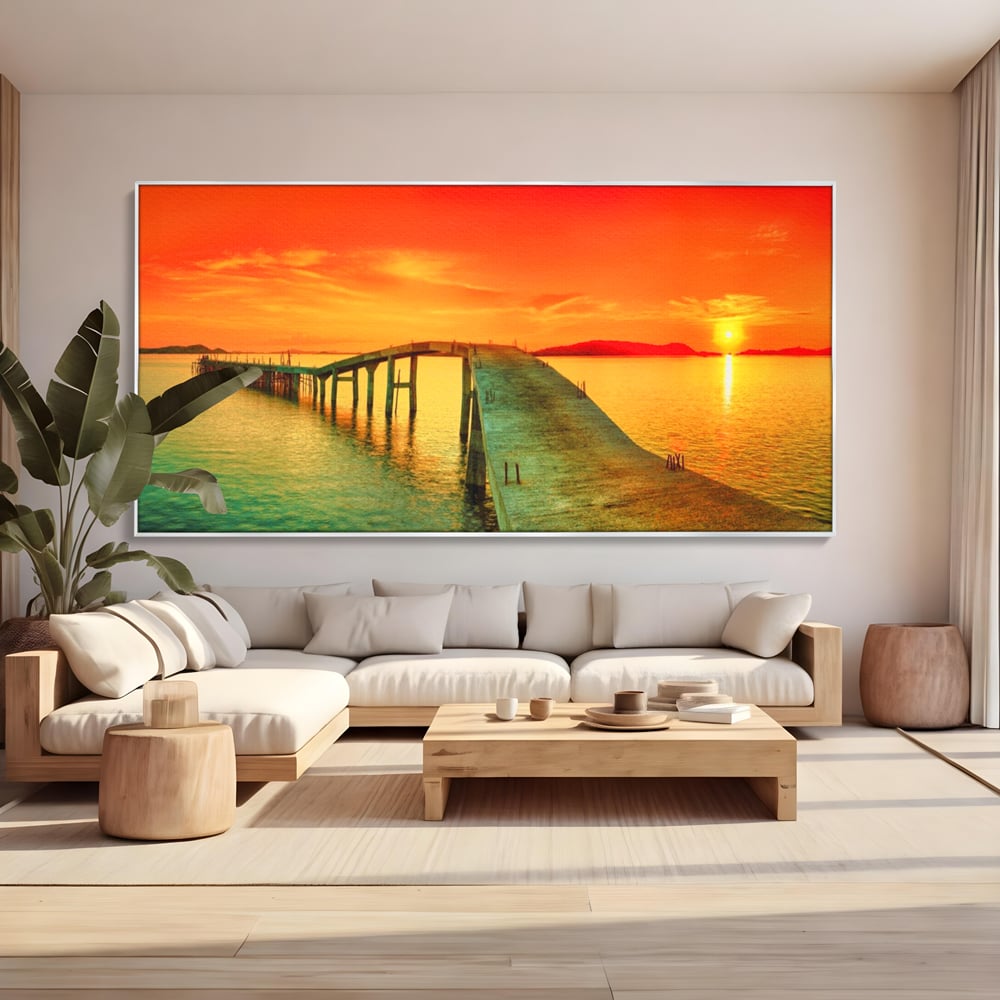 Tablou canvas cu tablou canvas cu pod si rasarit de soare, in rama de aluminiu argintiu, pe perete intr-un living