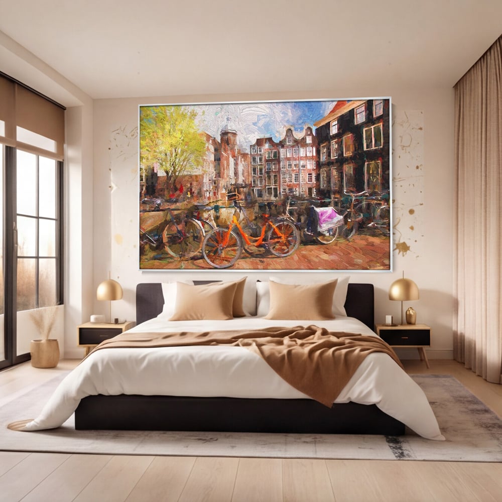 Tablou canvas cu tablou canvas cu bicicleta portocalie pe malul canalului, in rama de aluminiu argintiu, pe perete intr-un dormitor