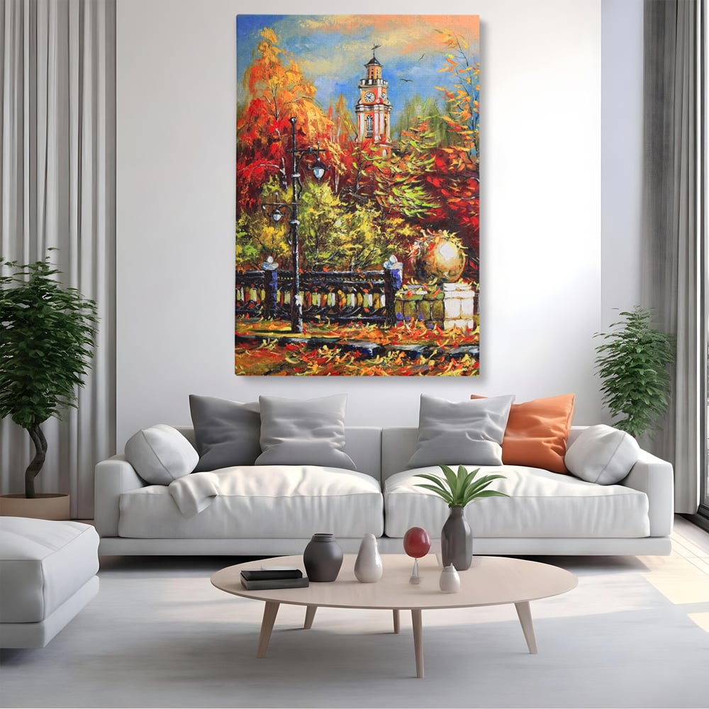 Tablou canvas cu pictura cu peisaj de toamna si turn cu ceas, fara rama, pe sasiu de lemn, pe perete intr-un living