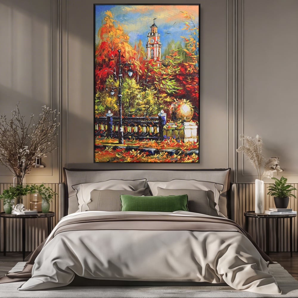 Tablou canvas cu pictura cu peisaj de toamna si turn cu ceas, in rama de aluminiu negru, pe perete intr-un dormitor