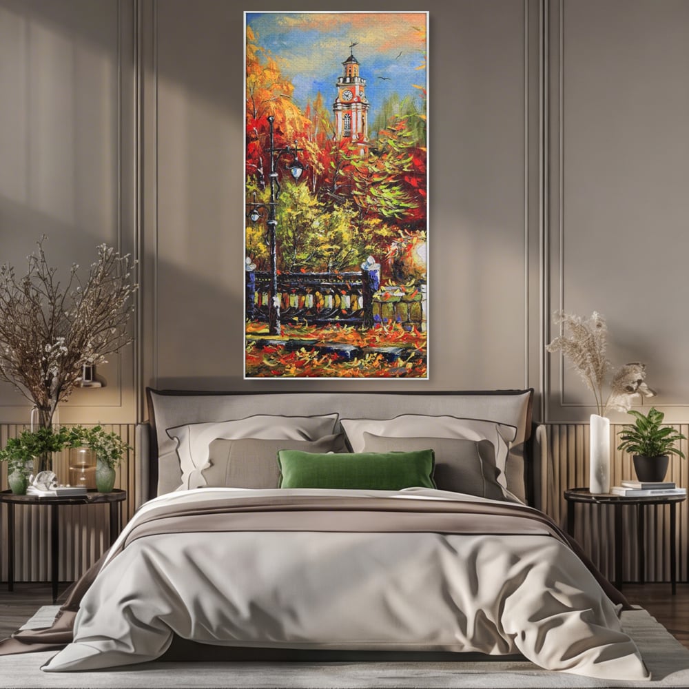 Tablou canvas cu pictura cu peisaj de toamna si turn cu ceas, in rama de aluminiu argintiu, pe perete intr-un dormitor