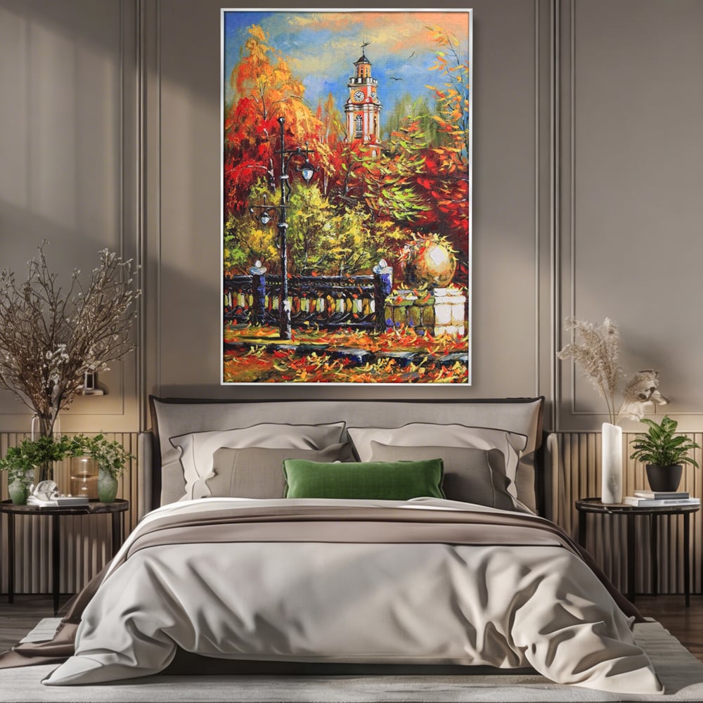 Tablou canvas cu pictura cu peisaj de toamna si turn cu ceas, in rama de aluminiu argintiu, pe perete intr-un dormitor