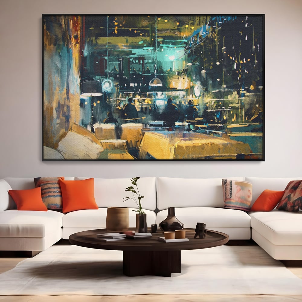 Tablou canvas cu pictura cu cafenea nocturna si lumini, in rama de aluminiu negru, pe perete intr-un living