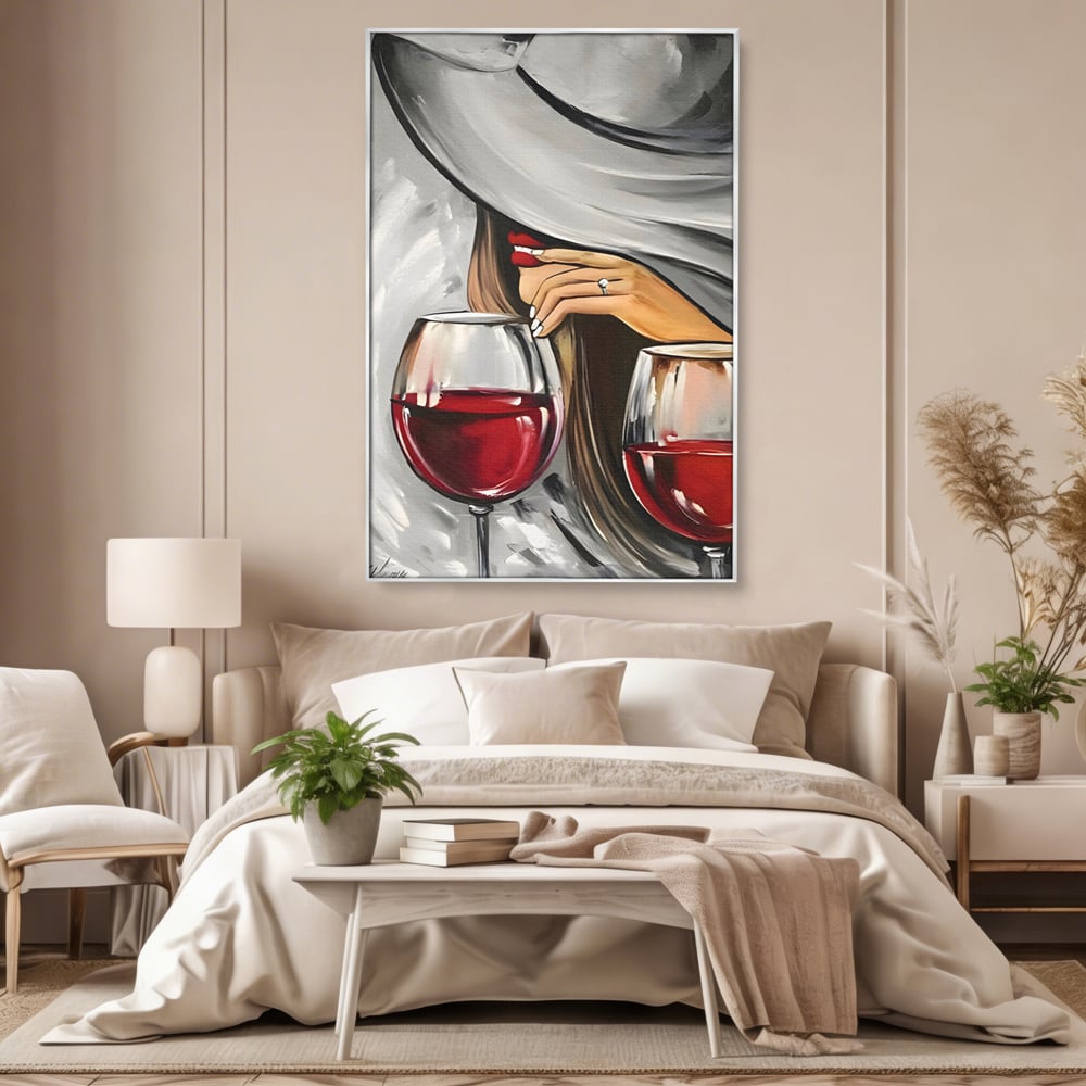 Tablou canvas cu tablou canvas cu femeie si vin rosu, in rama de aluminiu argintiu, pe perete intr-un dormitor