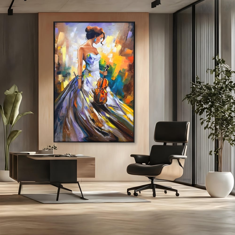 Tablou canvas cu tablou canvas cu femeie si vioara, in rama de aluminiu negru, pe perete intr-un birou