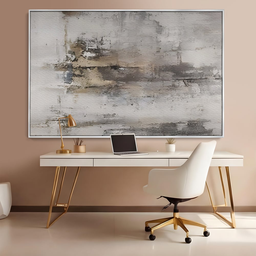 Tablou canvas cu pictura abstracta cu texturi gri si bronz, in rama de aluminiu argintiu, pe perete intr-un birou