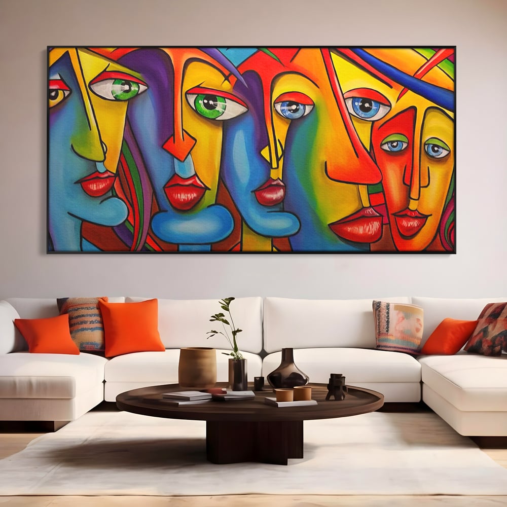 Tablou canvas cu tablou canvas cu fete abstracte colorate, in rama de aluminiu negru, pe perete intr-un living