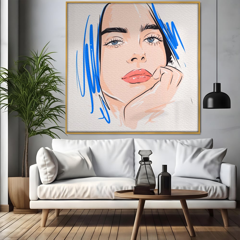 Tablou canvas cu ilustratie portret fata visatoare, in rama de aluminiu auriu, pe perete intr-un living