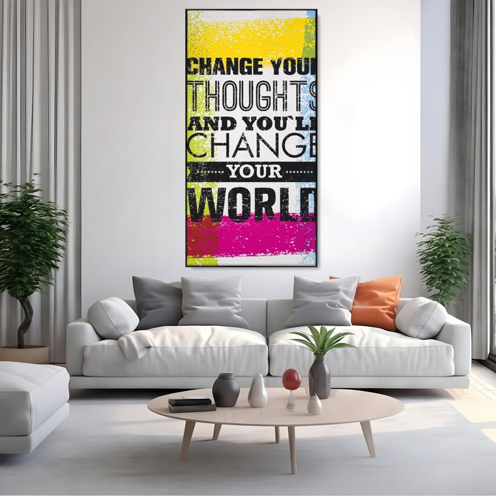 Tablou canvas cu tablou canvas cu mesaj motivational colorat, in rama de aluminiu negru, pe perete intr-un living