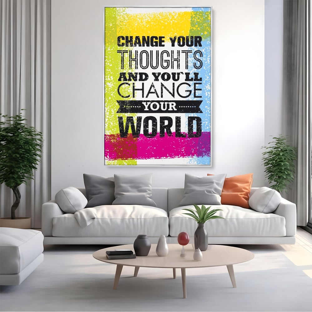 Tablou canvas cu tablou canvas cu mesaj motivational colorat, in rama de aluminiu argintiu, pe perete intr-un living