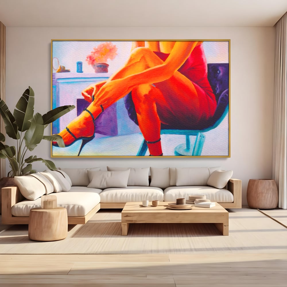 Tablou canvas cu pictura cu femeie in rochie rosie, in rama de aluminiu auriu, pe perete intr-un living