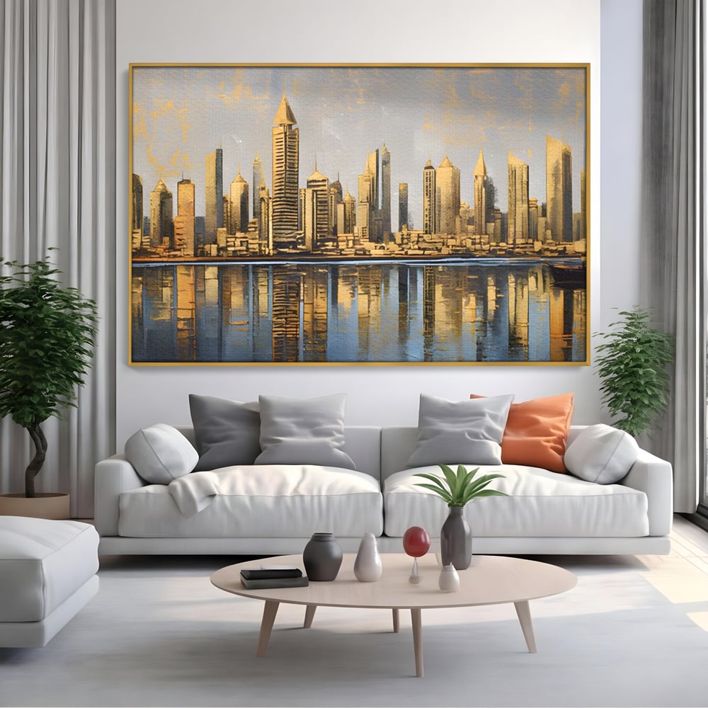 Tablou canvas cu tablou canvas cu peisaj urban si cladiri inalte, in rama de aluminiu auriu, pe perete intr-un living