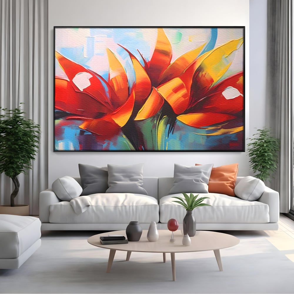 Tablou canvas cu pictura abstracta cu flori portocalii, in rama de aluminiu negru, pe perete intr-un living