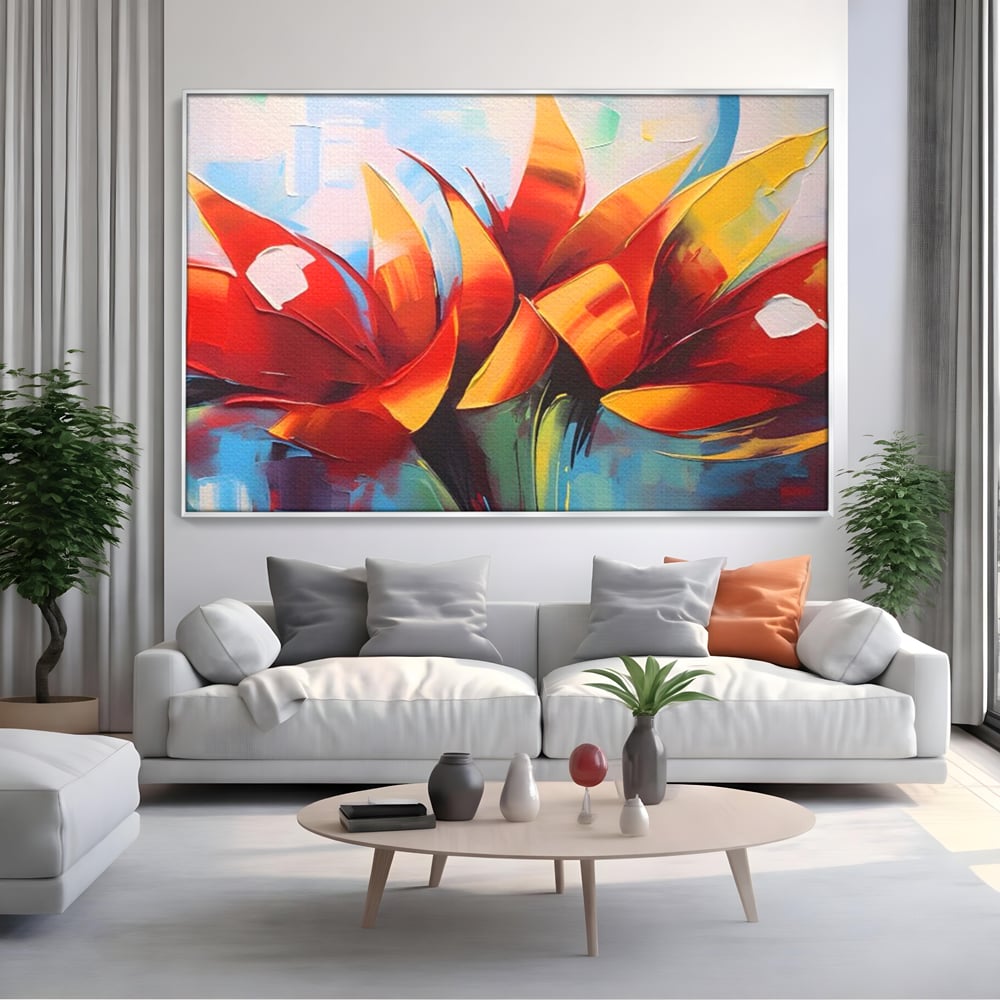 Tablou canvas cu pictura abstracta cu flori portocalii, in rama de aluminiu argintiu, pe perete intr-un living